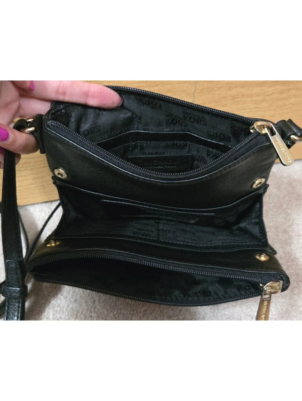 Michael Kors Black Leather Crossbody Bag with Gold Logo and Adjustable Strap